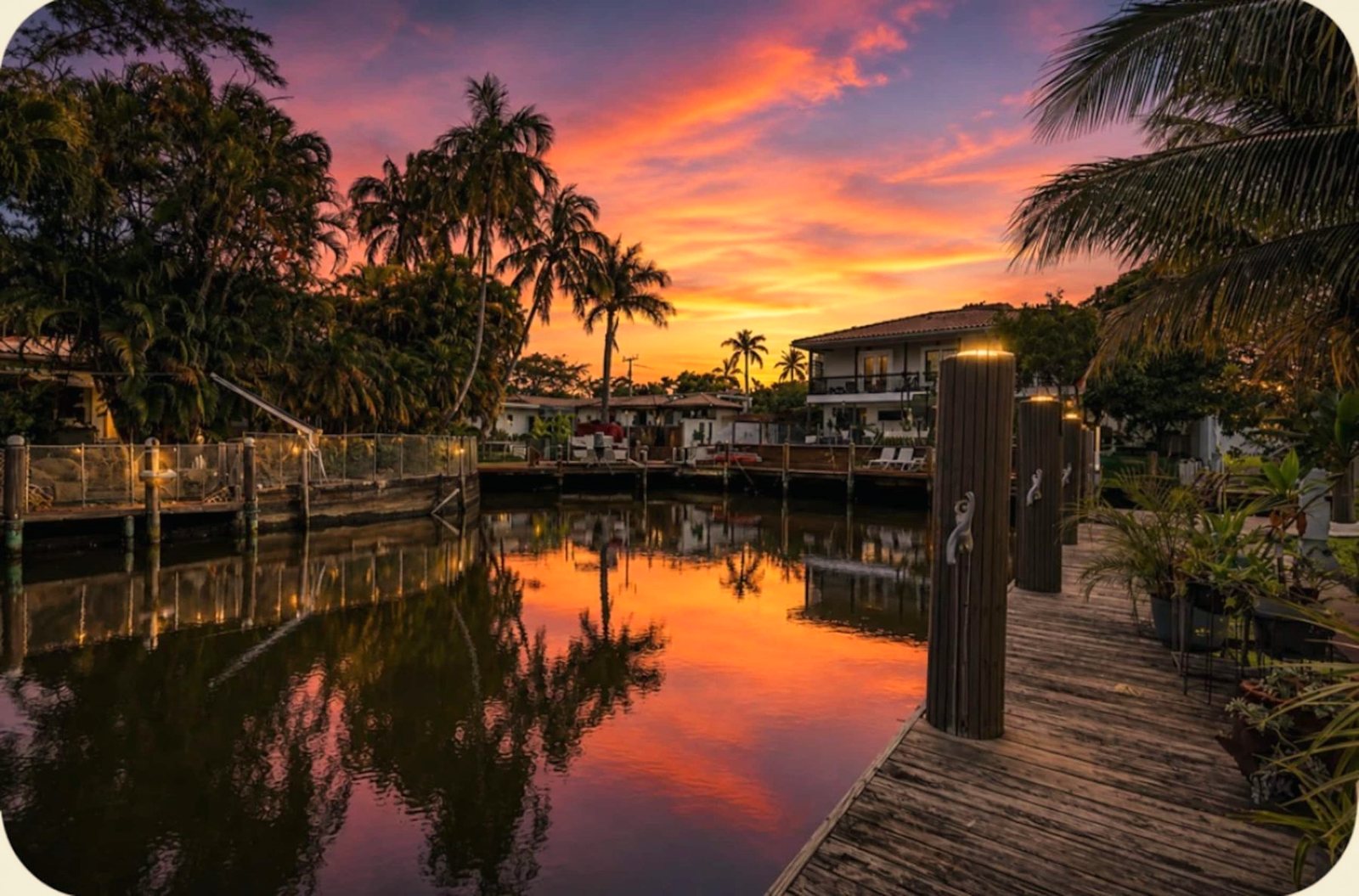 Sunset over the private dock and canal at the Cut-Off Canal Pool & Dock home BookedMore manages in the Fort Lauderdale area, Florida