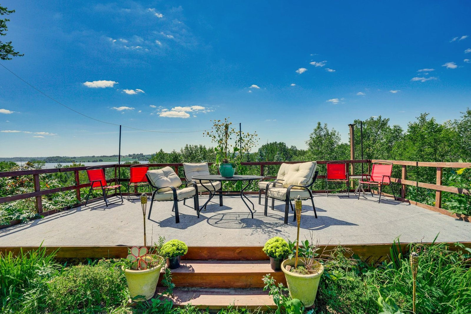 Lake-view deck at Eden Garden House Retreat, a home BookedMore co-hosts in Cokato, Minnesota